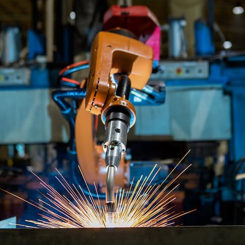 Robotic arm welding. Image Credit: Shutterstock.com/Factory_Easy