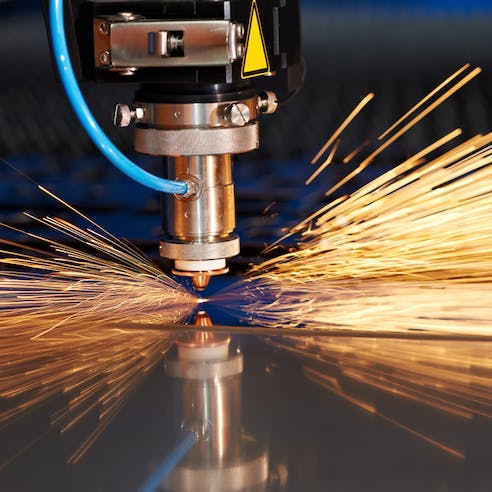 Industrial laser cutter. Image Credit: Shutterstock.com/Dmitry Kalinovsky