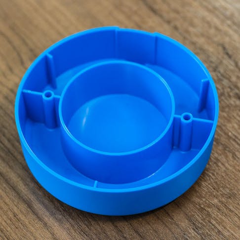 An example of plastic ribs in an blue injection molding part