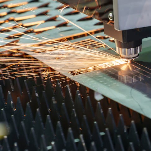Fiber laser cutting sheet metal. Image Credit: Shutterstock.com/Pixel B