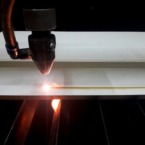 Laser cutting MDF. Image Credit: Shutterstock.com/Edinaldo Maciel