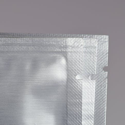 Close up of tear point on sheet foil package. Image Credit: Shutterstock.com/MMXeon