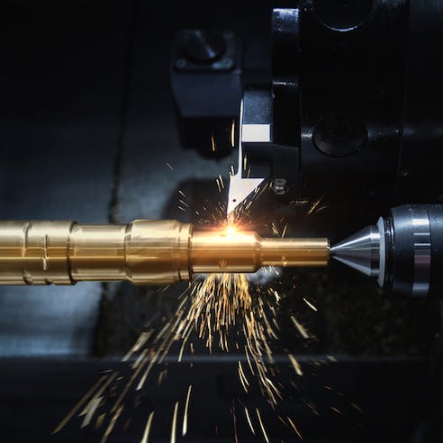 Metal CNC turning. Image Credit: Shutterstock.com/Red ivory